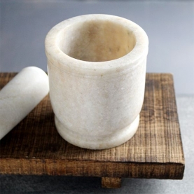 Mortier et pilon en marbre