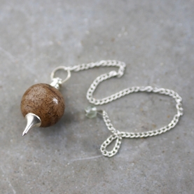 Spheric pendulum with brown onyx stone