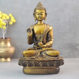 Golden resin Indian Buddha statue