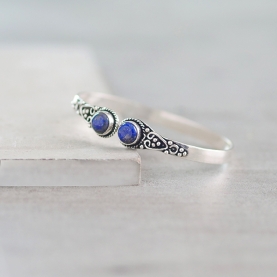 Metal bangle with lapis lazuli stones