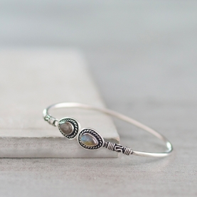 Metal bangle with labradorite stones