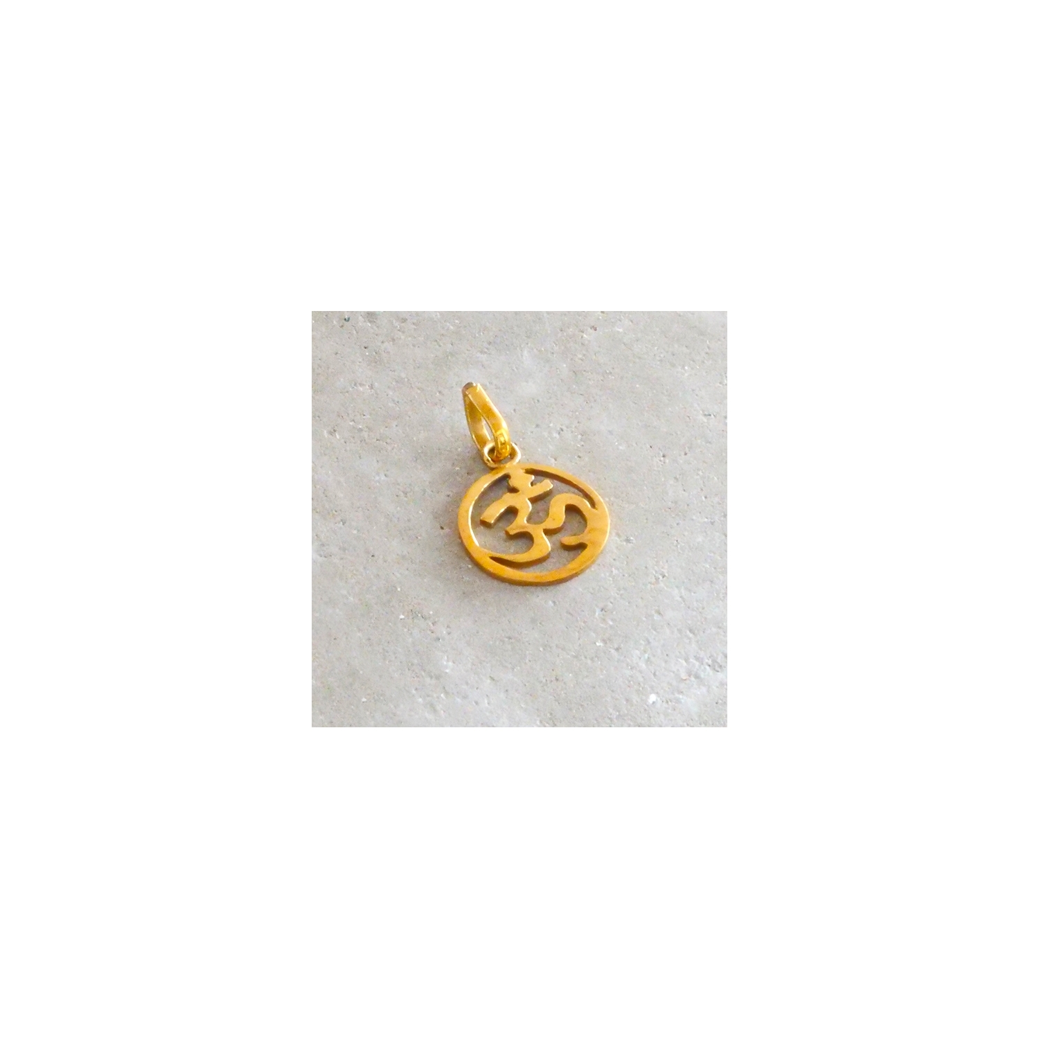 OM symbol brass pendant