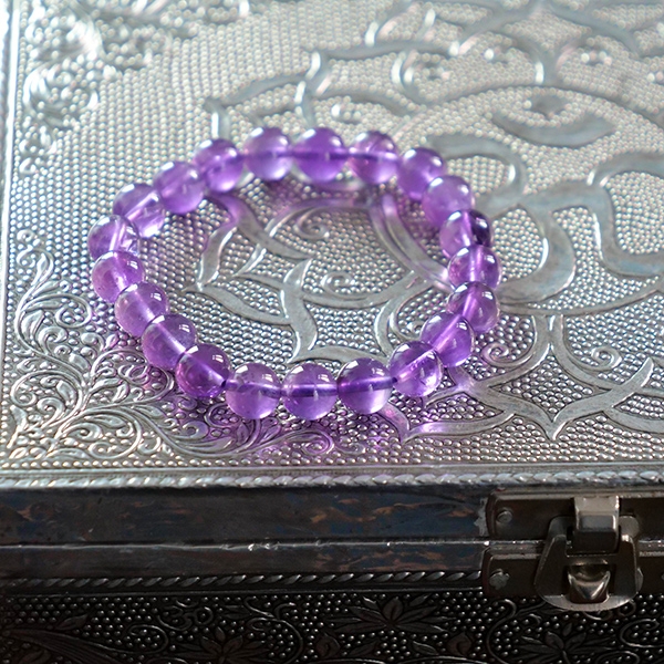 Bracelet with amethyst A stones Ø8mm