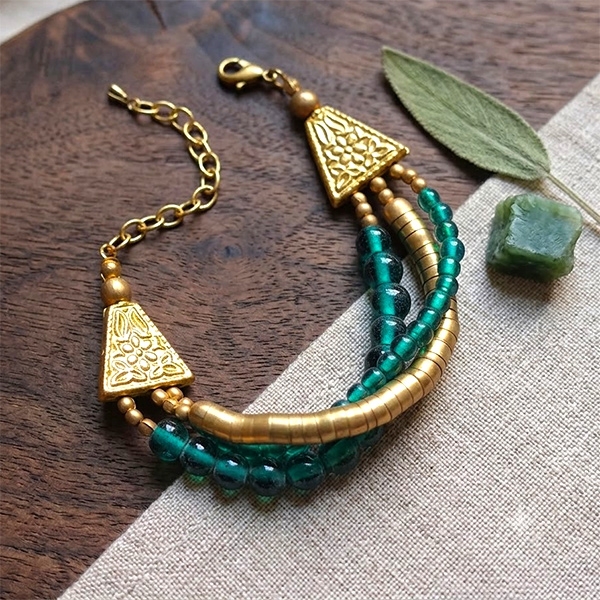 Bracelet indien souple avec perles bleues et dorés