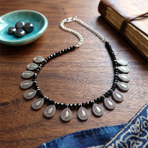 Indian ethnic necklace with flowers and black pearls