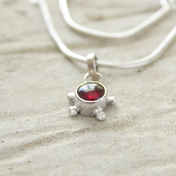 Silver and garnet stone Indian pendant